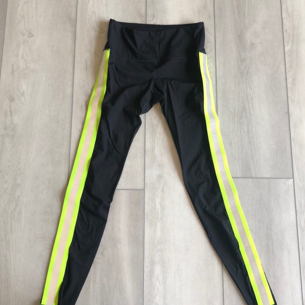 Black leggings with neon yellow sides